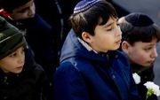 Kinderen tijdens de Nationale Holocaust Herdenking. beeld ANP, Robin Utrecht