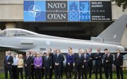 Tijdens de NAVO-top in Wales in 2014 kwamen de lidstaten overeen om binnen uiterlijk tien jaar ten minste 2 procent van het bbp aan defensie te besteden. beeld AFP, Leon Neal