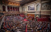 De Franse Assemblée nationale stemde woensdag voor een voorstel om homoseksuelen, die vroeger zouden zijn gediscrimineerd, tegemoet te komen. beeld EPA, Christophe Petit Tesson