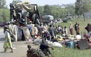 Bewoners van Jos, Nigeria, pakken hun spullen, na een periode van geweld tussen moslims en christenen. beeld EPA, Pius Utomi Ekpei