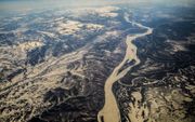 De Yukonrivier slingert door Alaska en voert vandaag de dag vooral regen- en smeltwater af naar de oceaan.  beeld UAF, Todd Paris