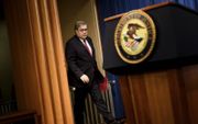 Minister van Justitie William Barr gaf donderdag een persconferentie voor de publicatie van het rapport van Mueller. beeld AFP, Brendan Smialowski