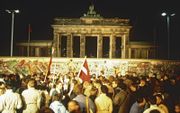 De hereniging van Duitsland bij de Brandenburger Tor in 1990. beeld RD, Henk Visscher