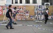 Verkiezingsposters in Brussel. België stemt zondag op zeven niveau’s: van regionaal tot Europees. beeld AFP, Emmanuel Dunand