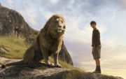 De leeuw Aslan is in de Narniaboeken een symbool van Christus.  beeld Walden Media