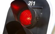 Hard op een rood stoplicht afrijden. beeld ANP, Koen Suyk