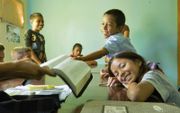 Bijbelclub voor kinderen in de gereformeerde kerk van Maracay. beeld Jaco Klamer