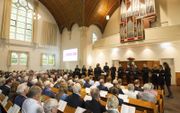 De viering van het 125-jarig jubileum van de Theologische Universiteit Apeldoorn in de Barnabaskerk.  beeld RD, Anton Dommerholt