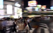 Drukte tijdens de avondspits in Tokio. beeld AFP, Franck Fife