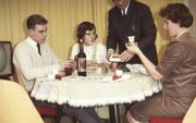 Een gezin in de jaren 50 van de vorige eeuw.  beeld Getty Images/Fortgens Photography