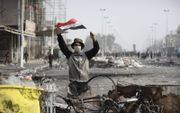 Protest in Irak. beeld AFP, Haidar Hamdani