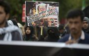 In de hele islamitische wereld gingen vrijdag mensen de straat op om te protesteren tegen de liquidatie van de Iraanse topgeneraal Soleimani. beeld AFP, Aamir Qureshi