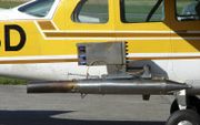 Apparatuur aan Cessna om regen te maken. beeld Wikimedia, Christian Jansky