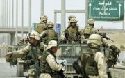 Amerikaanse troepen werden na de invasie van 2003 door de Iraakse bevolking nog als bevrijders beschouwd. beeld EPA, Ali Haider