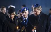 Koning Willem-Alexander en koningin Maxima bij de herdenking. beeld ANP, Remko de Waal