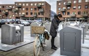 In Apeldoorn betalen burgers flink meer afvalstoffenheffing. Het tarief stijgt dit jaar met 58 euro en komt op 295 euro per jaar. beeld RD, Henk Visscher