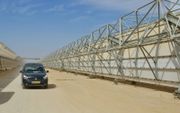 Een zonne-energiecentrale in de Negev. beeld Alfred Muller