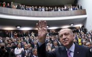 De Turkse president Erdogan zet Europa onder zware druk door te dreigen migranten door te laten.  beeld AFP, Adem Altan