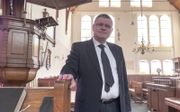 Ds. M. A. Post uit Stavenisse stelt elke dag de kerk een uur open voor mensen die behoefte hebben aan een pastoraal gesprek.  beeld Dirk-Jan Gjeltema