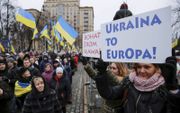 Bij deze Oekraïeners in Kiev is Europa favoriet, in tegenstelling tot de Russische Federatie. beeld EPA, Roman Pilipey
