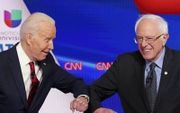 Bernie Sanders (r.) en Joe Biden. beeld AFP, Mandel Ngan