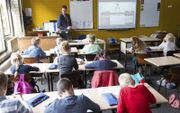 Kinderen mogen per 11 mei weer deels naar school. Foto: een klas op de Graaf Jan van Nassauschool in Gouda. beeld RD, Anton Dommerholt