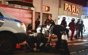 Plunderaars in New York gearresteerd. beeld AFP, Angela Weiss