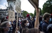 Demonstratie op de Place de la République in Parijs, dinsdag. beeld EPA, Yoan Valat