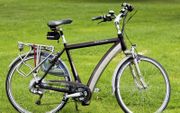 Sommige elektrische fietsen wegen bijna 30 kilo.  beeld ANP, Lex van Lieshout