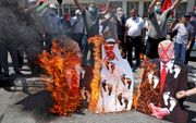 Palestijnen protesteren tegen het vredesplan tussen Israël en de Verenigde Arabische Emiraten. beeld AFP, Jaafar Ashtiyeh