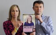 De ouders van de vermiste Madeleine McCann in 2012. beeld EPA, Facundo Arrizabalaga