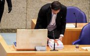 Minister Wopke Hoekstra pakt de begroting uit. beeld ANP, Bart Maat