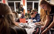 Lessenmarathon op het Ichthus College in Veenendaal. De school heeft vanouds een open toelatingsbeleid. „Variatie heeft meerwaarde, maar levert wel veel gespreksstof op.” beeld Niek Stam
