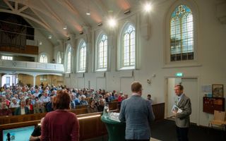 Viering van eenwording GKV en NGK, vrijdagmiddag in Utrechtse Singelkerk. Beeld Ruben Schipper
