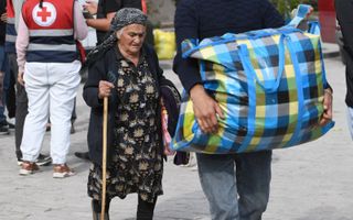 „Tienduizenden Armeniërs moeten vluchten voor hun leven, maar de Europese Unie en de internationale gemeenschap kijken de andere kant op of spreken met meel in de mond.” beeld AFP, Karen Minasyan