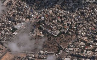 Satellietfoto van het Al-Ahli ziekenhuis in Gaza-stad kort na de dodelijke explosie dinsdag. beeld AFP, 2023 Maxar Technologies