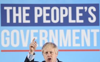 Boris Johnson belooft een ”nieuwe dageraad" na de overwinning van zijn Conservatieve Partij. beeld EPA, Neil Hall