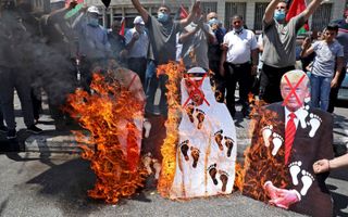 Palestijnen protesteren tegen het vredesplan tussen Israël en de Verenigde Arabische Emiraten. beeld AFP, Jaafar Ashtiyeh
