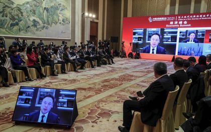 Elon Musk, voorman van Tesla Inc, sprak zaterdag op het China Development Forum in Peking. China wil via dit forum leidend zijn op het terrein van industriële vernieuwing. beeld EPA, Wu Hong.