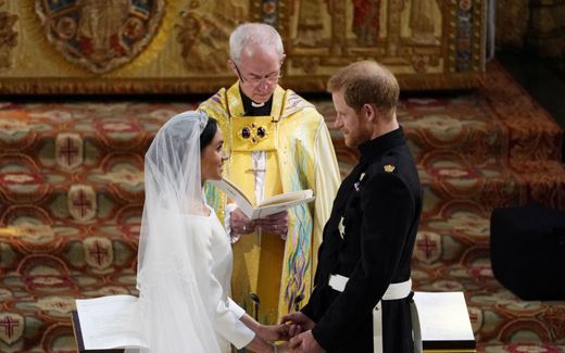 Aartsbisschop Justin Welby trouwt prins Harry en Meghan Markle, op 19 mei 2018. beeld AFP, Owen Humphreys