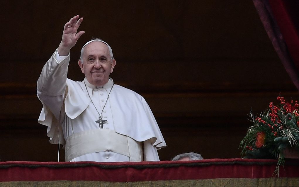 Paus Franciscus heeft in zijn traditionele kerstzegen Urbi et Orbi gewaarschuwd voor het gevaar dat we ons afzonderen van anderen in deze tijden van pandemie, en roept op tot dialoog. beeld AFP, Filippo MONTEFORTE