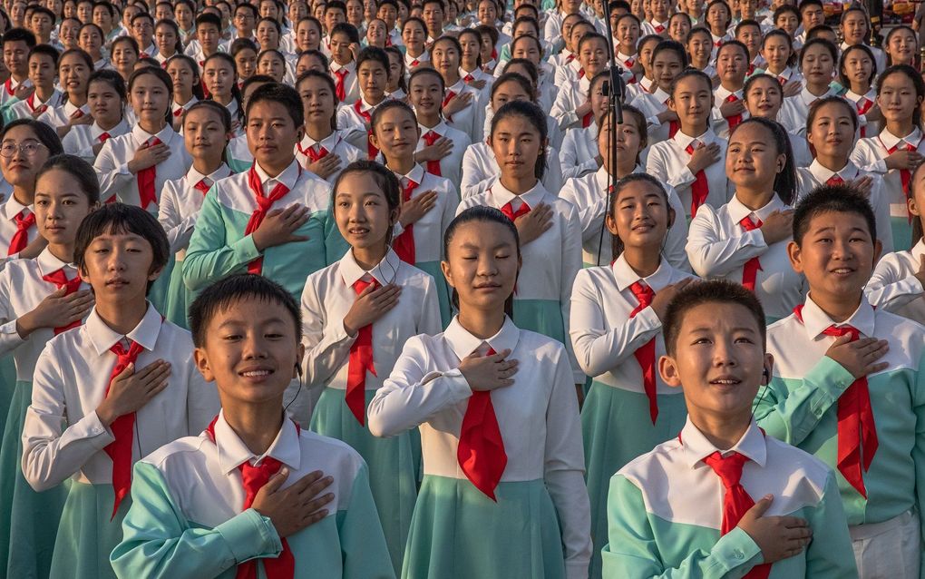 Schoolkinderen op het Tiananmenplein in Peking. beeld EPA, Roman Pilipey