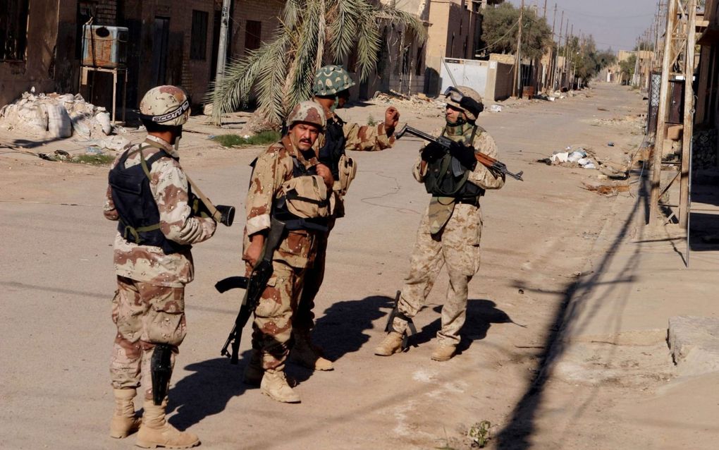 Amerikaanse militairen in de straten van Fallujah. Foto EPA