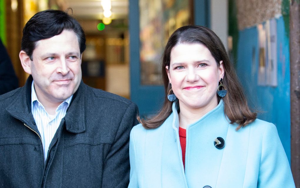 Jo Swinson en haar man. beeld AFP