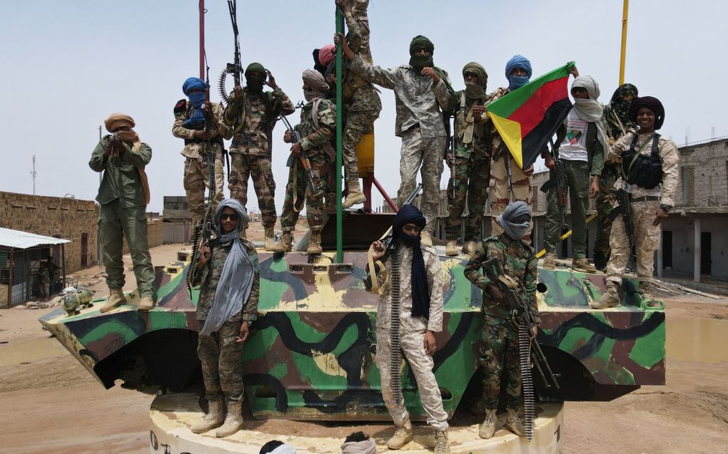 In Mali zijn gewapende jihadisten en separatistische groeperingen actief. Hier poseren strijders van de Nationale Beweging voor de Bevrijding van Azawad. beeld AFP, Souleymane Ag Anara