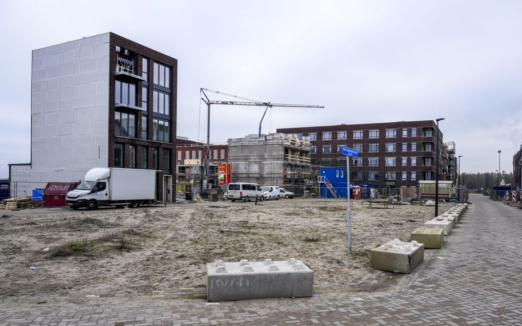 Woningen in aanbouw. In veel appartementencomplexen spelen langer lopende conflicten. beeld ANP, Lex van Lieshout