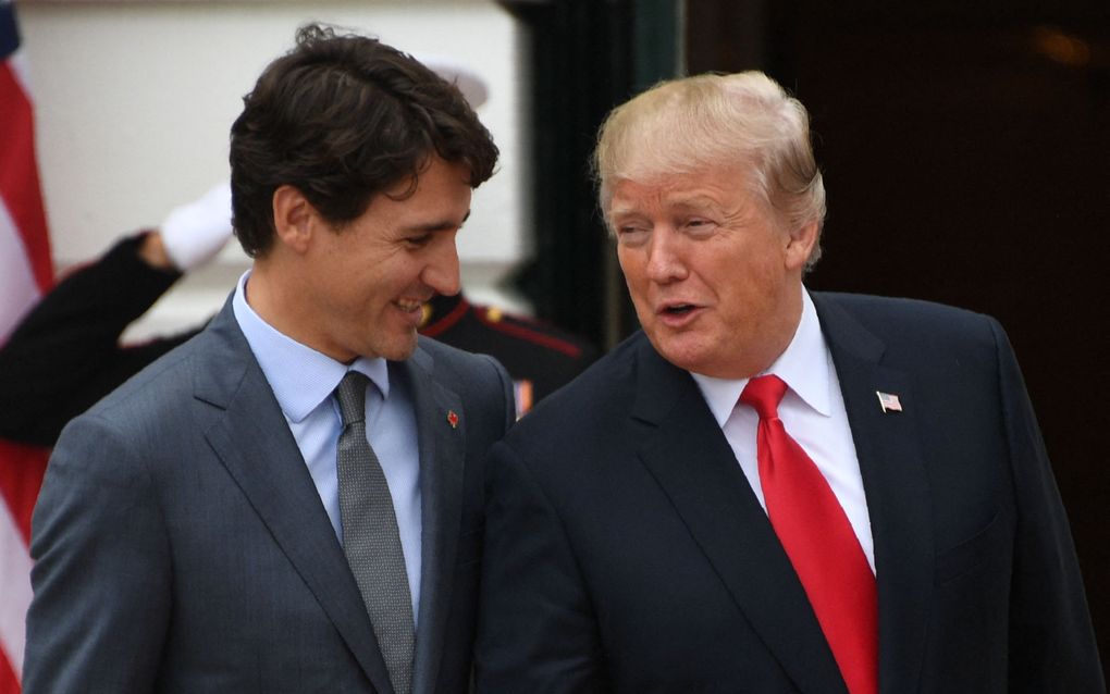 De Canadese premier Justin Trudeau en toenmalig Amerikaans president Donald Trump in 2017 op het Witte Huis in Washington D.C., de hoofdstad van de VS. beeld AFP, Jim Watson. 