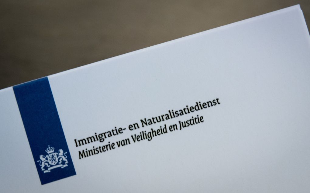 Het logo van de Immigratie- en Naturalisatiedienst (IND). beeld ANP, Lex van Lieshout