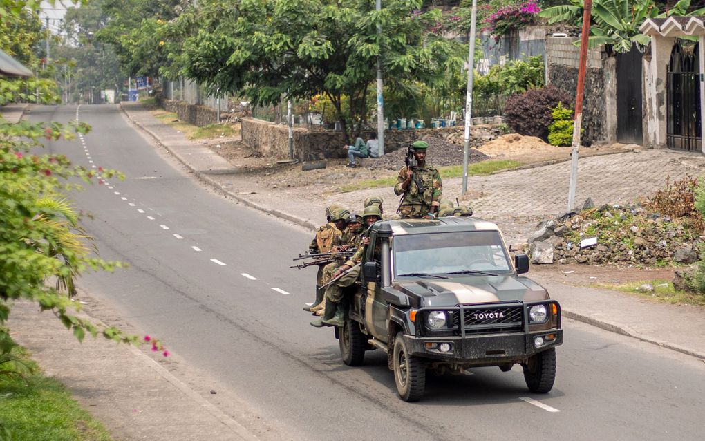 Militairen in een lege straat in Goma. beeld AFP