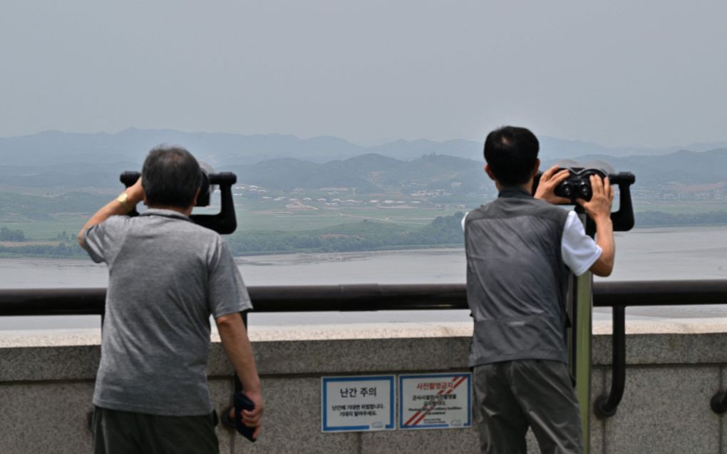 Uitzicht op de Noord-Koreaanse kant van de gedemilitariseerde zone tussen de beide Korea’s. beeld AFP, Jung Yeon-je